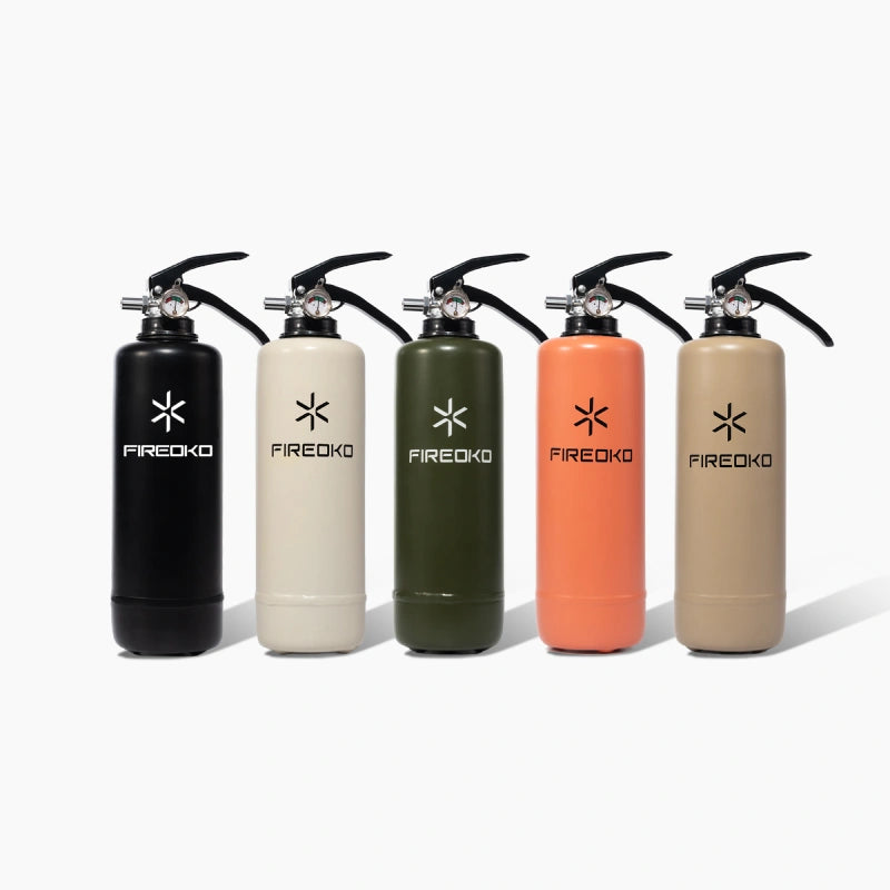 Fireoko fire extinguisher collection showing five color variants including black, white, olive green, salmon pink, and beige displayed side by side.